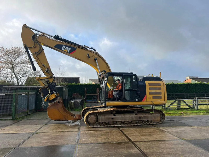 Caterpillar 324 EL, CE, 9655 HOURS, ROTOTILT - Pelle sur chenille: photos 1 Caterpillar 324 EL, CE, 9655 HOURS, ROTOTILT - Pelle sur chenille: photos 1
