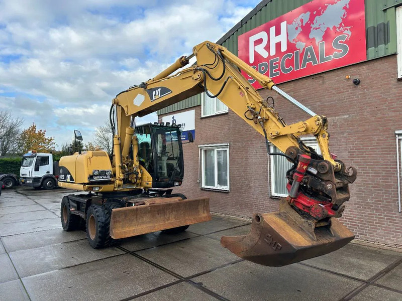Caterpillar M315C WITH ROTOTILT, CE - Pelle sur pneus: photos 4 Caterpillar M315C WITH ROTOTILT, CE - Pelle sur pneus: photos 4