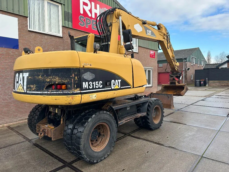 Caterpillar M315C WITH ROTOTILT, CE - Pelle sur pneus: photos 5 Caterpillar M315C WITH ROTOTILT, CE - Pelle sur pneus: photos 5