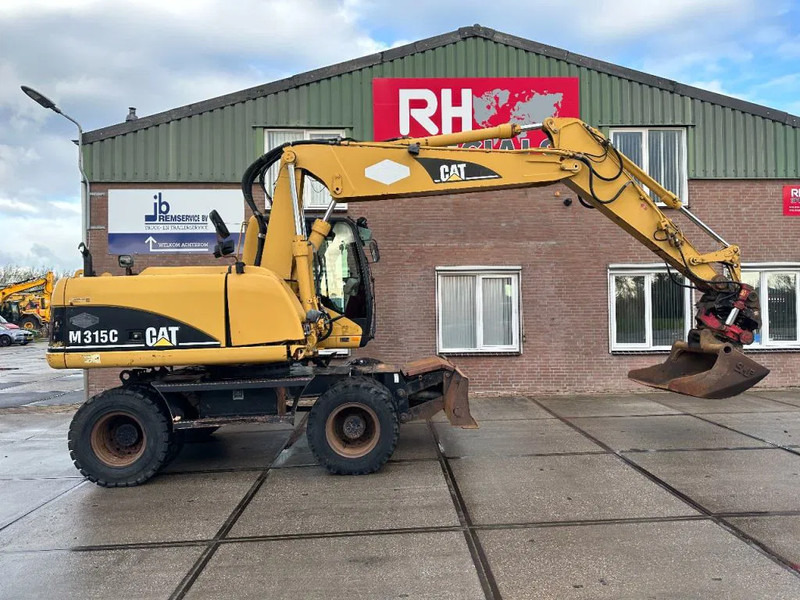 Caterpillar M315C WITH ROTOTILT, CE - Pelle sur pneus: photos 2 Caterpillar M315C WITH ROTOTILT, CE - Pelle sur pneus: photos 2