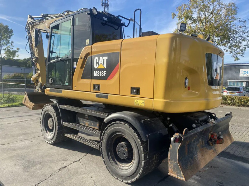 Caterpillar M318F - Pelle sur pneus: photos 4 Caterpillar M318F - Pelle sur pneus: photos 4