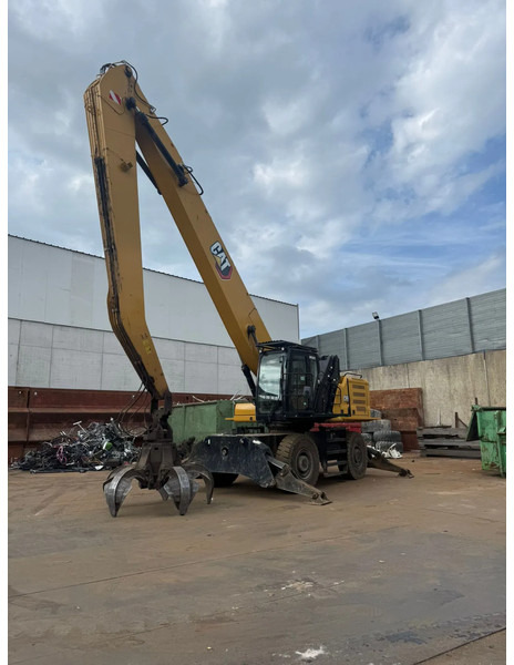 Caterpillar MH 3040, 2821 HOURS - Pelle sur pneus: photos 1 Caterpillar MH 3040, 2821 HOURS - Pelle sur pneus: photos 1
