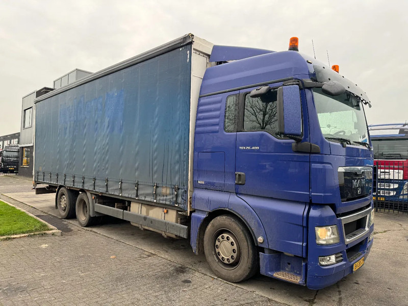MAN TGX 26.400 6X2 - EURO 4 + LIFT + STEERING AXLE + TÜV 10-2025 - Camion à rideaux coulissants: photos 3 MAN TGX 26.400 6X2 - EURO 4 + LIFT + STEERING AXLE + TÜV 10-2025 - Camion à rideaux coulissants: photos 3