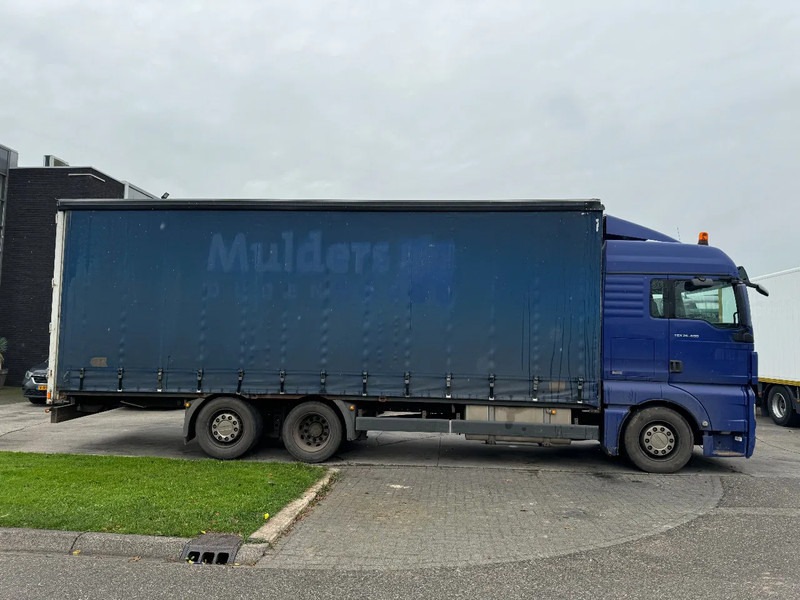 MAN TGX 26.400 6X2 - EURO 4 + LIFT + STEERING AXLE + TÜV 10-2025 - Camion à rideaux coulissants: photos 4 MAN TGX 26.400 6X2 - EURO 4 + LIFT + STEERING AXLE + TÜV 10-2025 - Camion à rideaux coulissants: photos 4