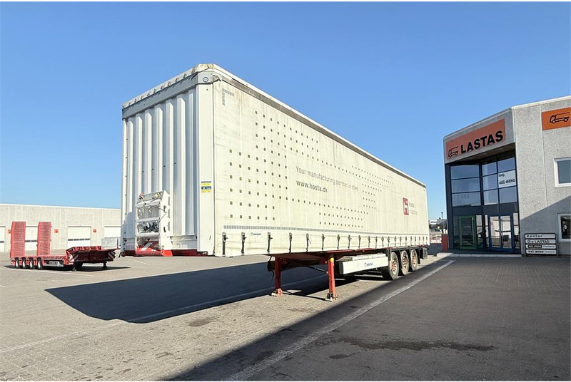 Krone 34 pl. - Semi-remorque rideaux coulissants: photos 1 Krone 34 pl. - Semi-remorque rideaux coulissants: photos 1