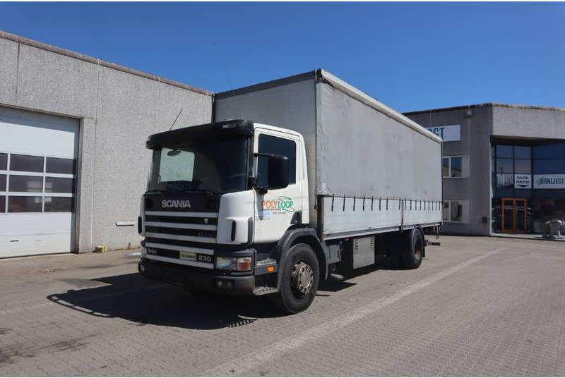 Scania P 94-230 Curtainsider/Plane/Gardin - Camion à rideaux coulissants: photos 1 Scania P 94-230 Curtainsider/Plane/Gardin - Camion à rideaux coulissants: photos 1