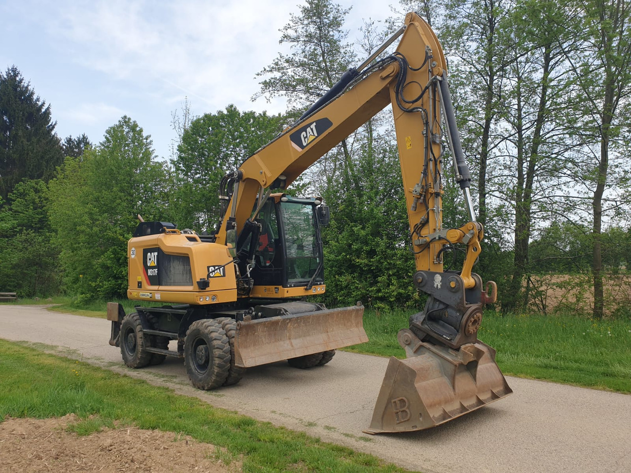CATERPILLAR M 317 F - Pelle sur pneus: photos 4 CATERPILLAR M 317 F - Pelle sur pneus: photos 4