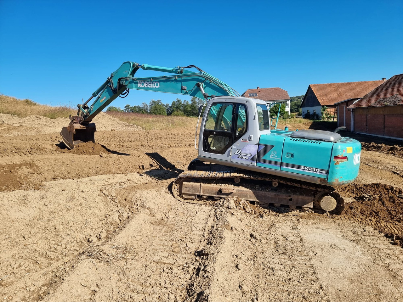 KOBELCO SK 210 NLC-6E - Pelle sur chenille: photos 1 KOBELCO SK 210 NLC-6E - Pelle sur chenille: photos 1