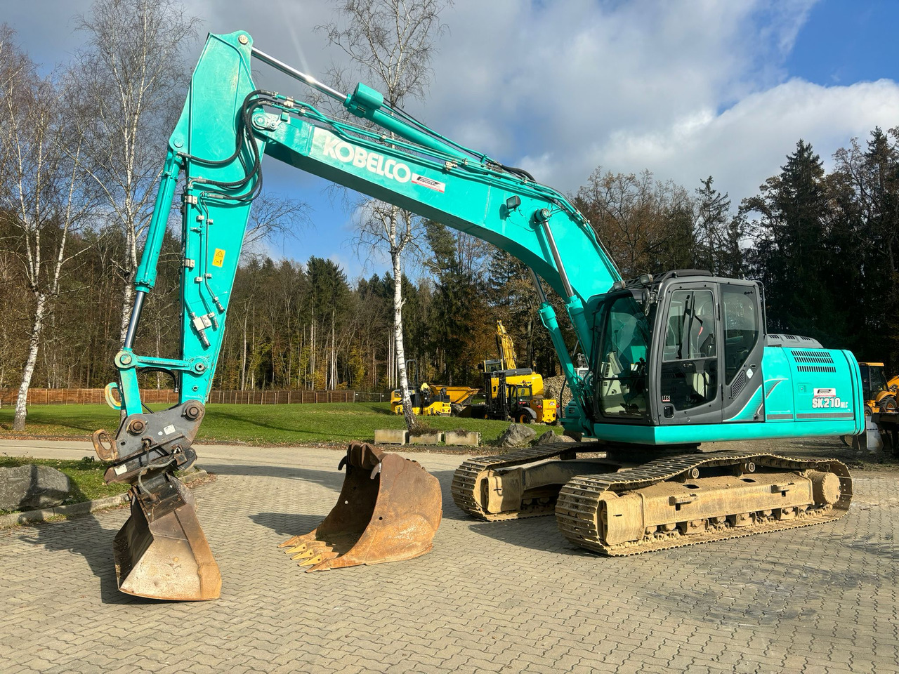 Kobelco SK 210 NLC-9 - Pelle sur chenille: photos 3 Kobelco SK 210 NLC-9 - Pelle sur chenille: photos 3