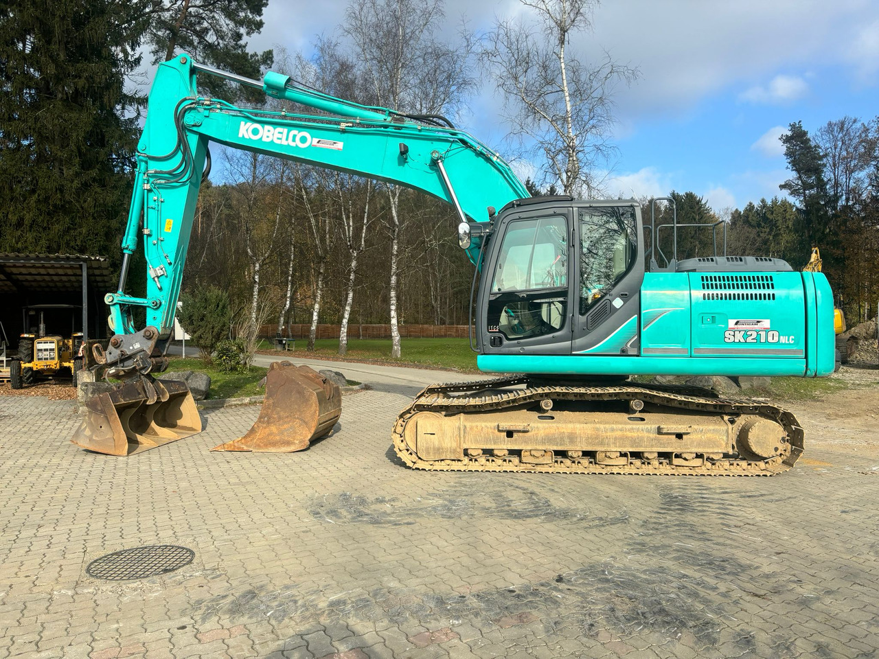 Kobelco SK 210 NLC-9 - Pelle sur chenille: photos 1 Kobelco SK 210 NLC-9 - Pelle sur chenille: photos 1