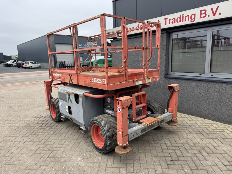 Skyjack SJ 6826RT Schaarhoogwerker / Scissor / Arbeitsbuhne 2015 4X4 Kubota Diesel 10M Werkhoogte - Nacelle ciseaux: photos 3 Skyjack SJ 6826RT Schaarhoogwerker / Scissor / Arbeitsbuhne 2015 4X4 Kubota Diesel 10M Werkhoogte - Nacelle ciseaux: photos 3