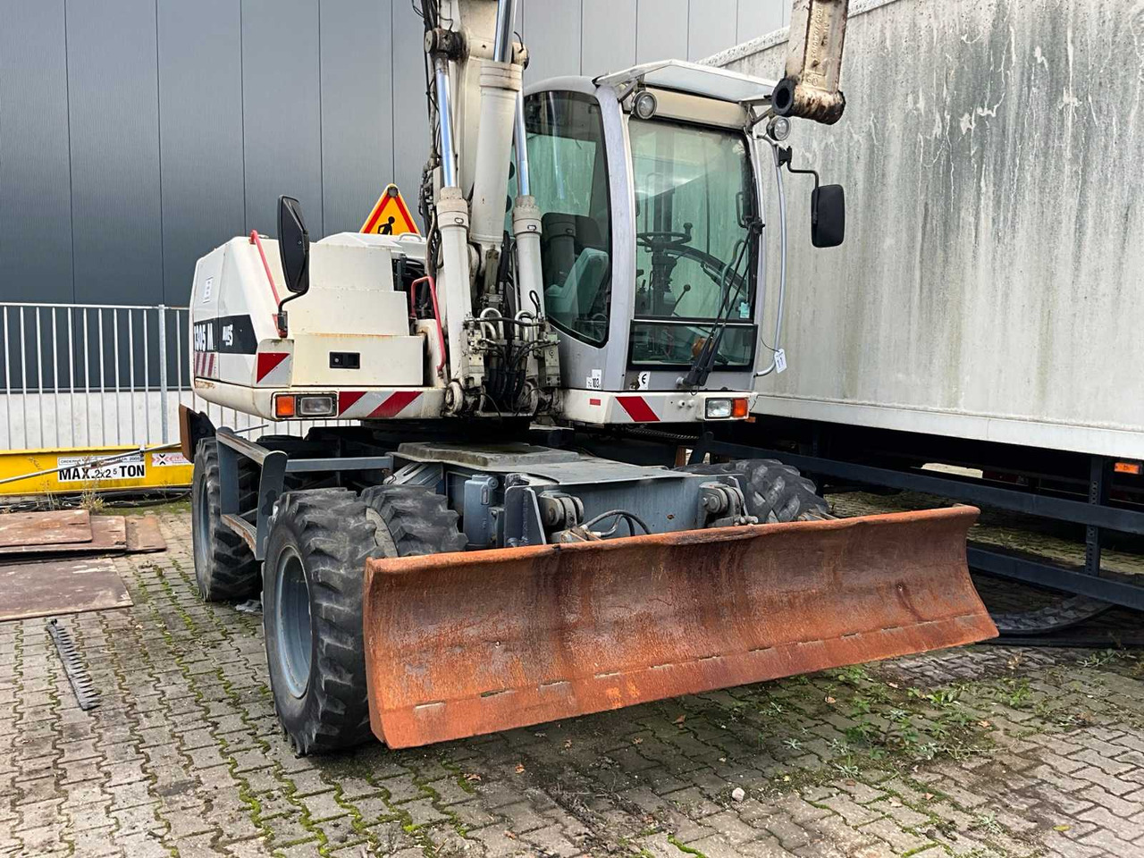 Pelle sur pneus Atlas 1305M: photos 6 Pelle sur pneus Atlas 1305M: photos 6