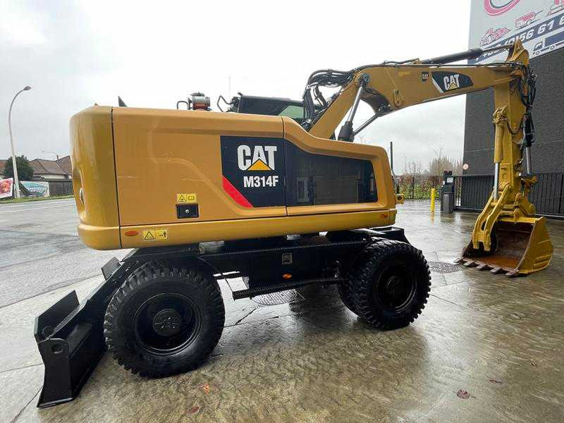 Caterpillar M314F - Pelle sur pneus: photos 3 Caterpillar M314F - Pelle sur pneus: photos 3