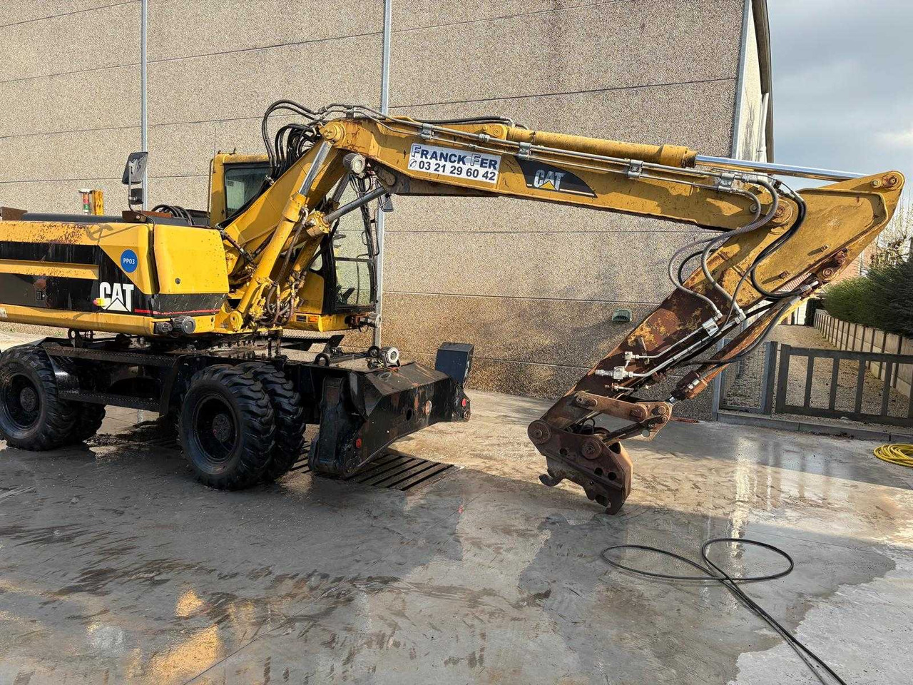 Caterpillar M315 - Pelle sur pneus: photos 1 Caterpillar M315 - Pelle sur pneus: photos 1