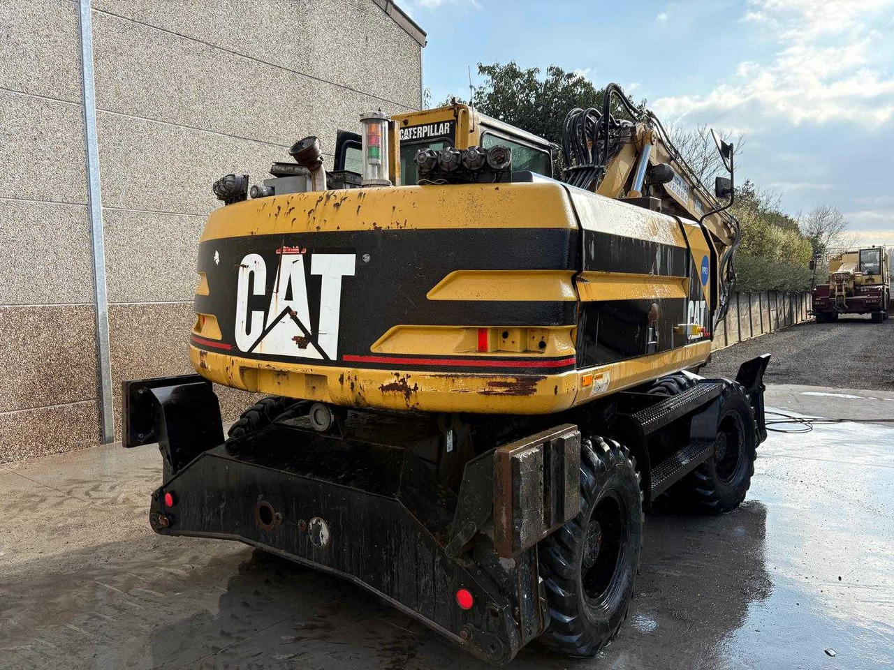Caterpillar M315 - Pelle sur pneus: photos 3 Caterpillar M315 - Pelle sur pneus: photos 3