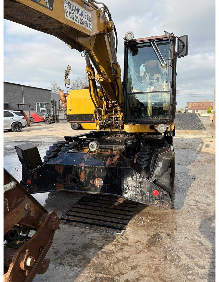 Caterpillar M315 - Pelle sur pneus: photos 5 Caterpillar M315 - Pelle sur pneus: photos 5