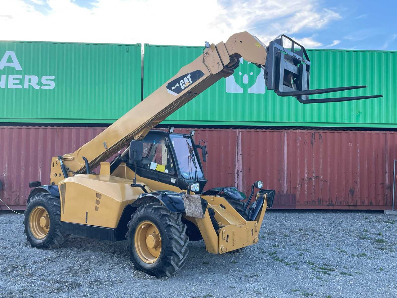 Caterpillar TH414 - Chargeuse sur pneus: photos 1 Caterpillar TH414 - Chargeuse sur pneus: photos 1