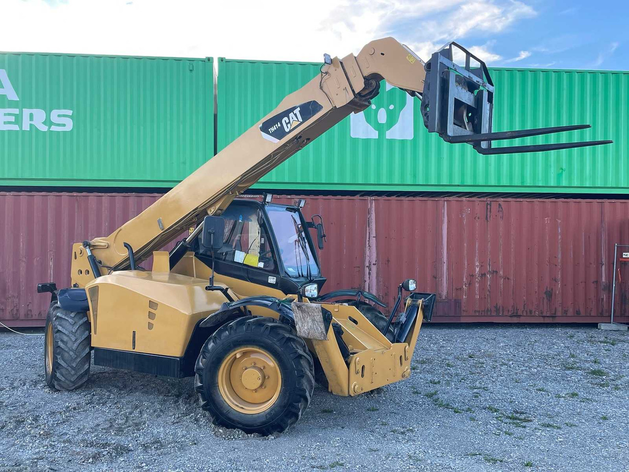 Caterpillar TH414 - Chargeuse sur pneus: photos 3 Caterpillar TH414 - Chargeuse sur pneus: photos 3