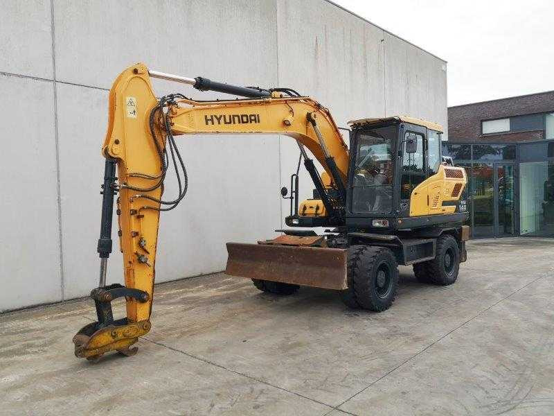 Hyundai HW140 - Pelle sur pneus: photos 1 Hyundai HW140 - Pelle sur pneus: photos 1