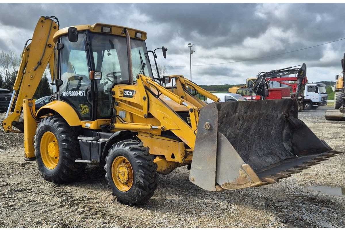 JCB 3CX-4T - Tractopelle: photos 1 JCB 3CX-4T - Tractopelle: photos 1