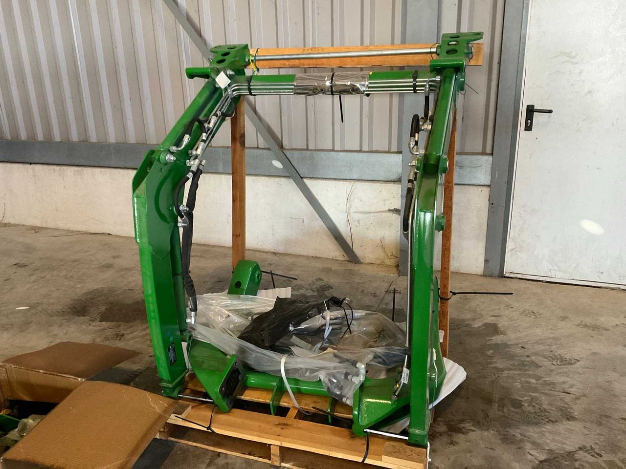 John Deere - Chargeur frontal pour tracteur: photos 1 John Deere - Chargeur frontal pour tracteur: photos 1