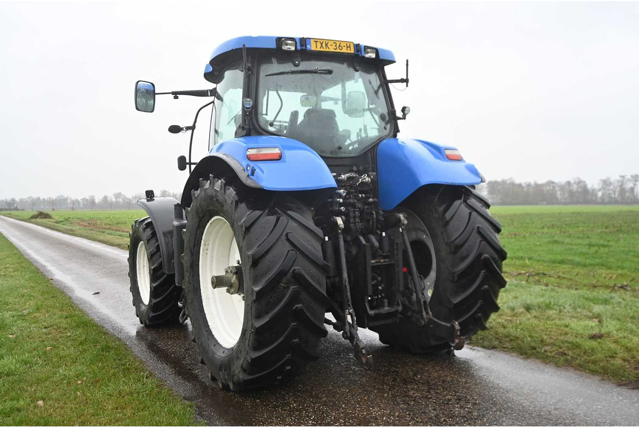 NEW HOLLAND - 2007 - T7030 - ALL-WHEEL DRIVE FARM TRACTOR - Tracteur agricole: photos 5 NEW HOLLAND - 2007 - T7030 - ALL-WHEEL DRIVE FARM TRACTOR - Tracteur agricole: photos 5