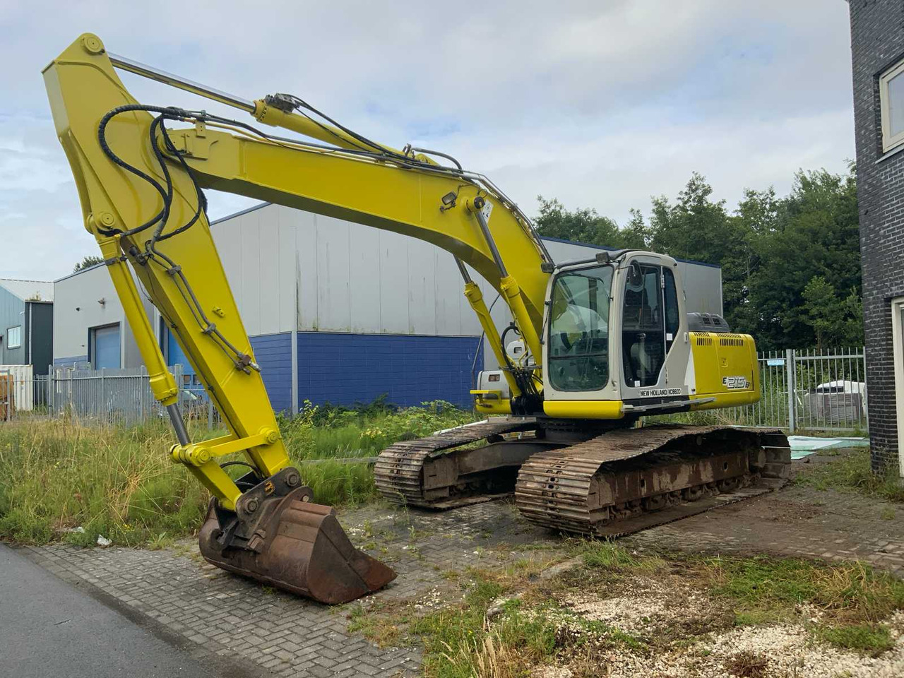 New Holland E 215B - Pelle sur chenille: photos 1 New Holland E 215B - Pelle sur chenille: photos 1