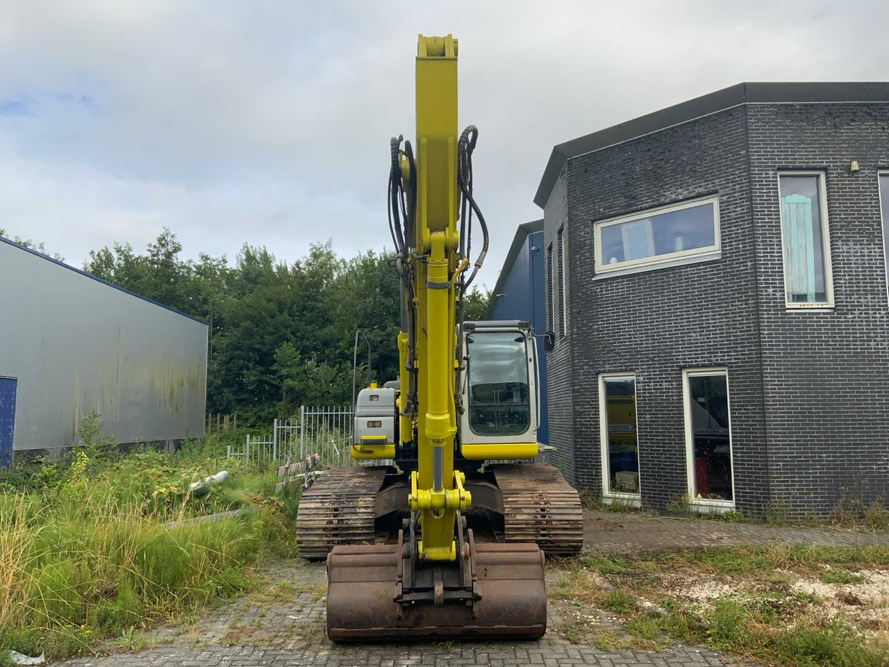 New Holland E 215B - Pelle sur chenille: photos 3 New Holland E 215B - Pelle sur chenille: photos 3