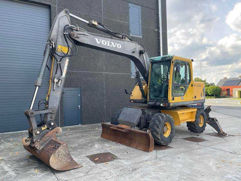 Volvo EW 140 B - Pelle sur pneus: photos 1 Volvo EW 140 B - Pelle sur pneus: photos 1