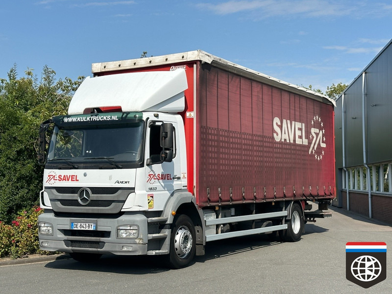 Mercedes-Benz AXOR 1833 TAIL LIFT - MANUAL GEARBOX - Camion à rideaux coulissants: photos 1 Mercedes-Benz AXOR 1833 TAIL LIFT - MANUAL GEARBOX - Camion à rideaux coulissants: photos 1
