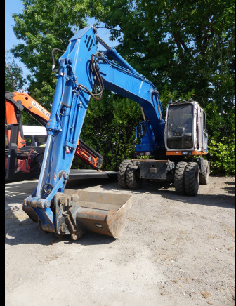 Grue sur pneus Hitachi EX165W - Pelle sur pneus: photos 1 Grue sur pneus Hitachi EX165W - Pelle sur pneus: photos 1