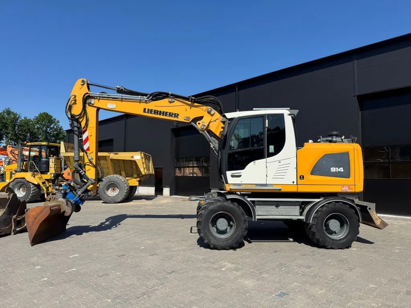 Liebherr A914 2018 8950 uur NL Machine - Pelle sur pneus: photos 1 Liebherr A914 2018 8950 uur NL Machine - Pelle sur pneus: photos 1