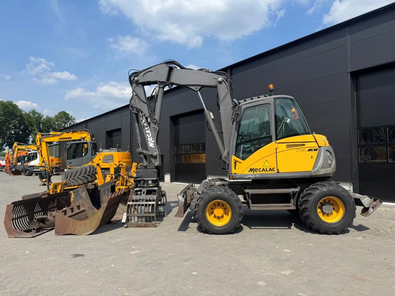 Mecalac 714MW FULL ATTACHMENTS OVERCOMPLEET !!! - Pelle sur pneus: photos 1 Mecalac 714MW FULL ATTACHMENTS OVERCOMPLEET !!! - Pelle sur pneus: photos 1