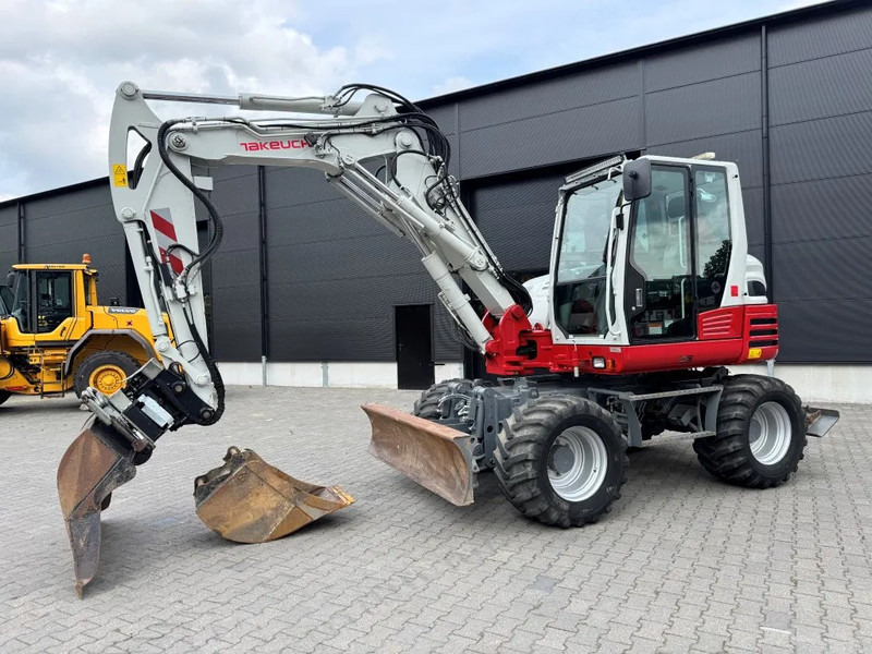 Takeuchi TB295W BJ 2021 3500 uur Compacttilt Draaikantelstuk met Gripper ! - Pelle sur pneus: photos 2 Takeuchi TB295W BJ 2021 3500 uur Compacttilt Draaikantelstuk met Gripper ! - Pelle sur pneus: photos 2