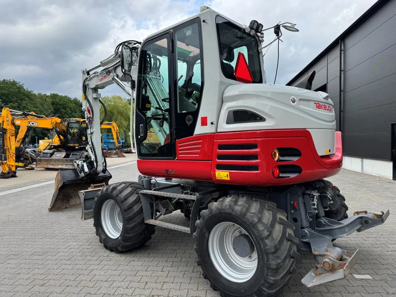 Takeuchi TB295W BJ 2021 3500 uur Compacttilt Draaikantelstuk met Gripper ! - Pelle sur pneus: photos 3 Takeuchi TB295W BJ 2021 3500 uur Compacttilt Draaikantelstuk met Gripper ! - Pelle sur pneus: photos 3