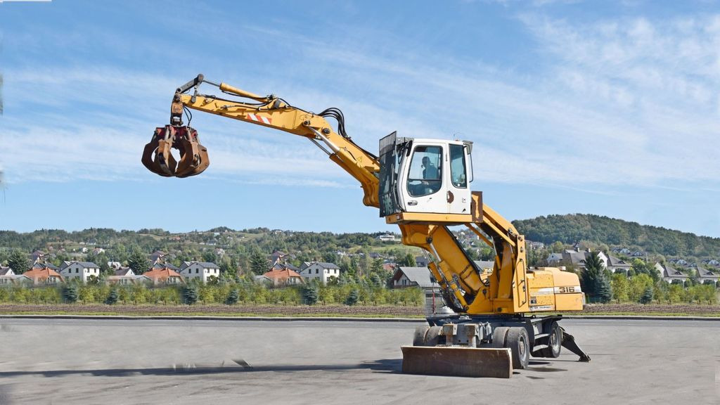 Liebherr PELLE A316 * Umschlagbagger * Topzustand! - Pelle sur pneus: photos 1 Liebherr PELLE A316 * Umschlagbagger * Topzustand! - Pelle sur pneus: photos 1
