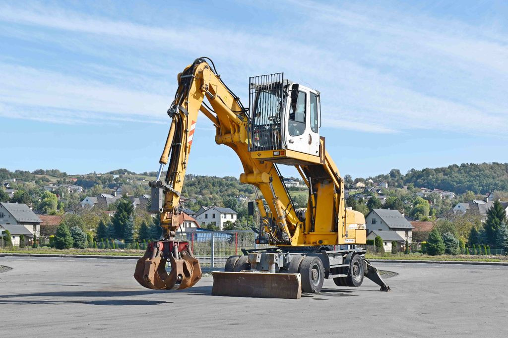 Liebherr PELLE A316 * Umschlagbagger * Topzustand! - Pelle sur pneus: photos 2 Liebherr PELLE A316 * Umschlagbagger * Topzustand! - Pelle sur pneus: photos 2