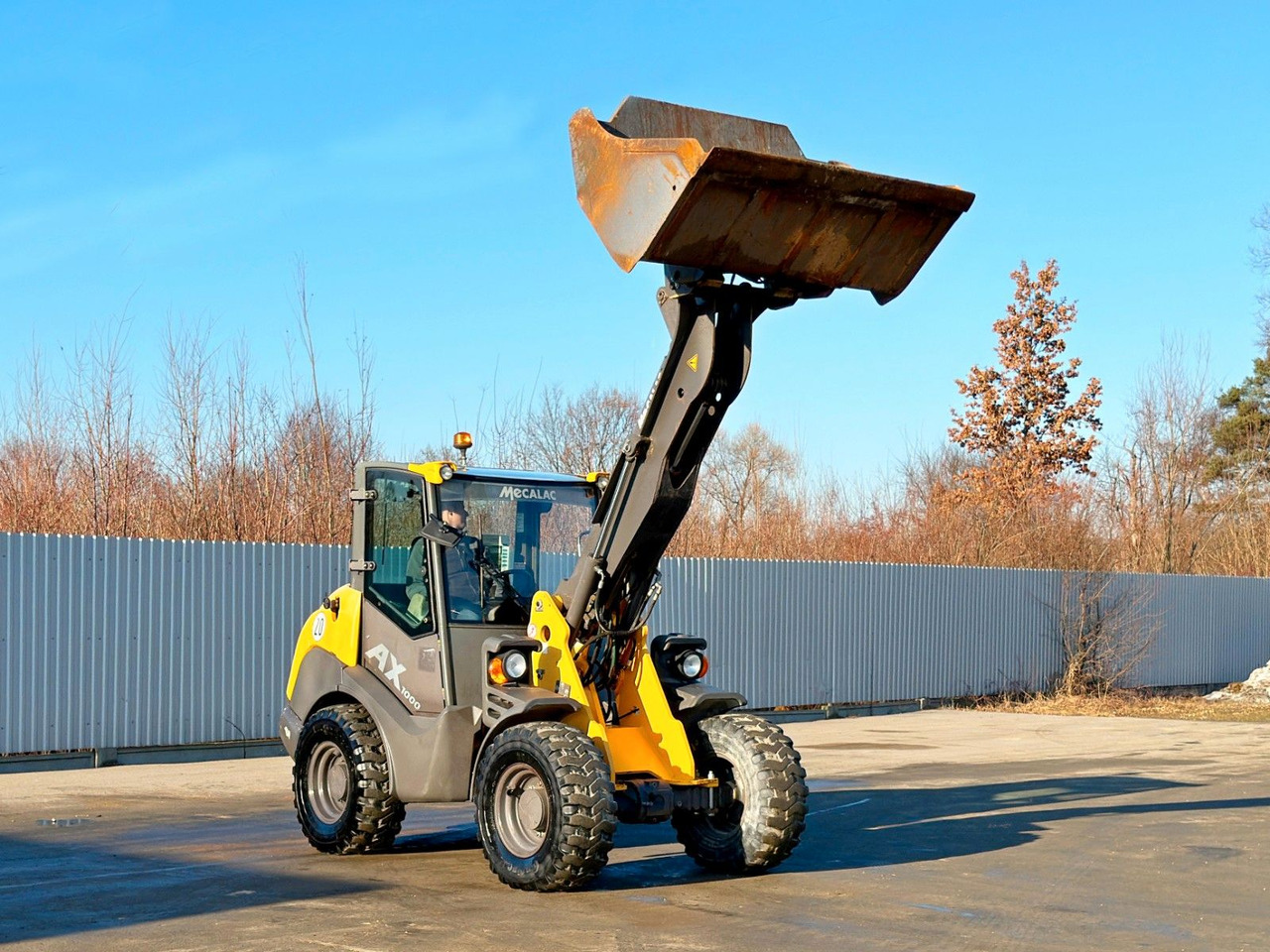 MECALAC AHLMANN AX 1000 * RADLADER * TOP - Chargeuse sur pneus: photos 1 MECALAC AHLMANN AX 1000 * RADLADER * TOP - Chargeuse sur pneus: photos 1