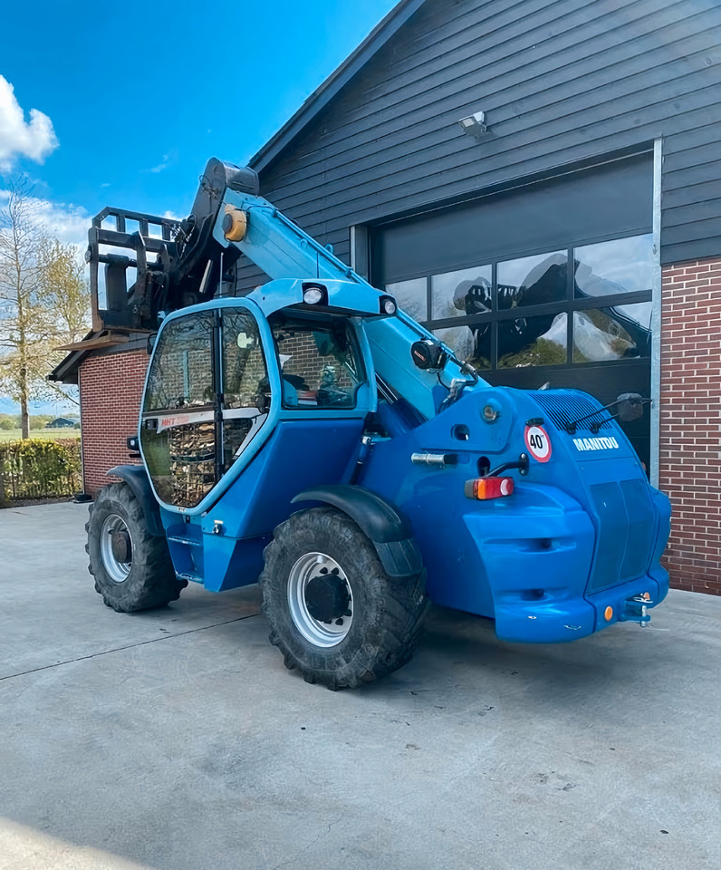 Manitou MHT 780 - Chargeuse sur pneus télescopique: photos 3 Manitou MHT 780 - Chargeuse sur pneus télescopique: photos 3