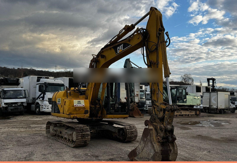 Caterpillar 311C Mit Zwei Löffeln - Pelle sur chenille: photos 1 Caterpillar 311C Mit Zwei Löffeln - Pelle sur chenille: photos 1