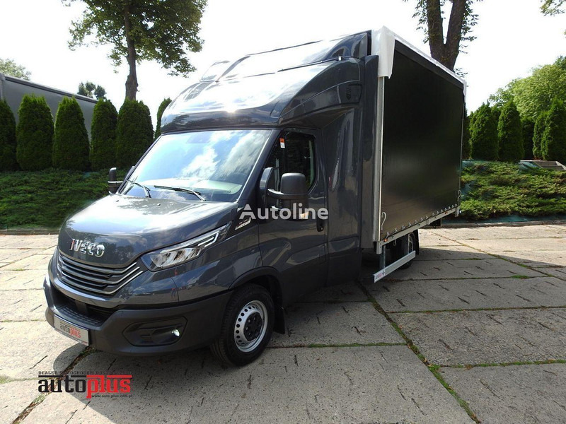 Iveco Daily 35S18 Curtain side - Véhicule utilitaire plateau baché: photos 1 Iveco Daily 35S18 Curtain side - Véhicule utilitaire plateau baché: photos 1