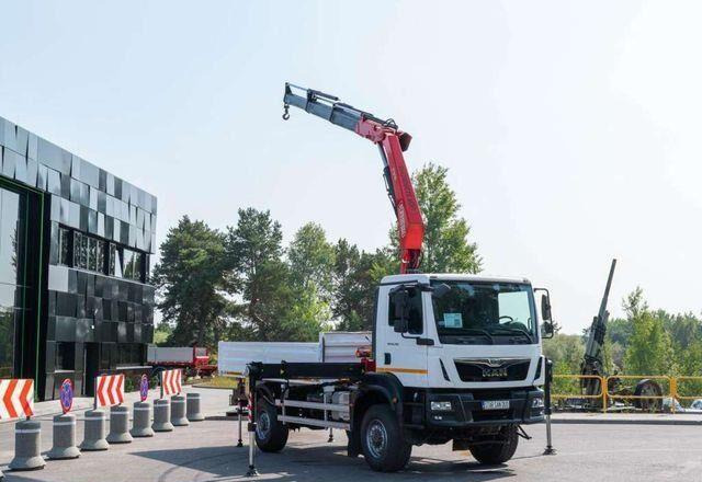 MAN TGM 18.250 4x4 Fassi F215A.0.23 Active HDS Cran - Camion plateau, Camion grue: photos 2 MAN TGM 18.250 4x4 Fassi F215A.0.23 Active HDS Cran - Camion plateau, Camion grue: photos 2