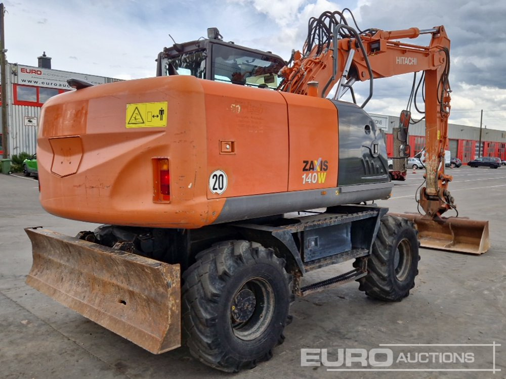 2010 Hitachi ZX140W-3 - Pelle sur pneus: photos 5 2010 Hitachi ZX140W-3 - Pelle sur pneus: photos 5