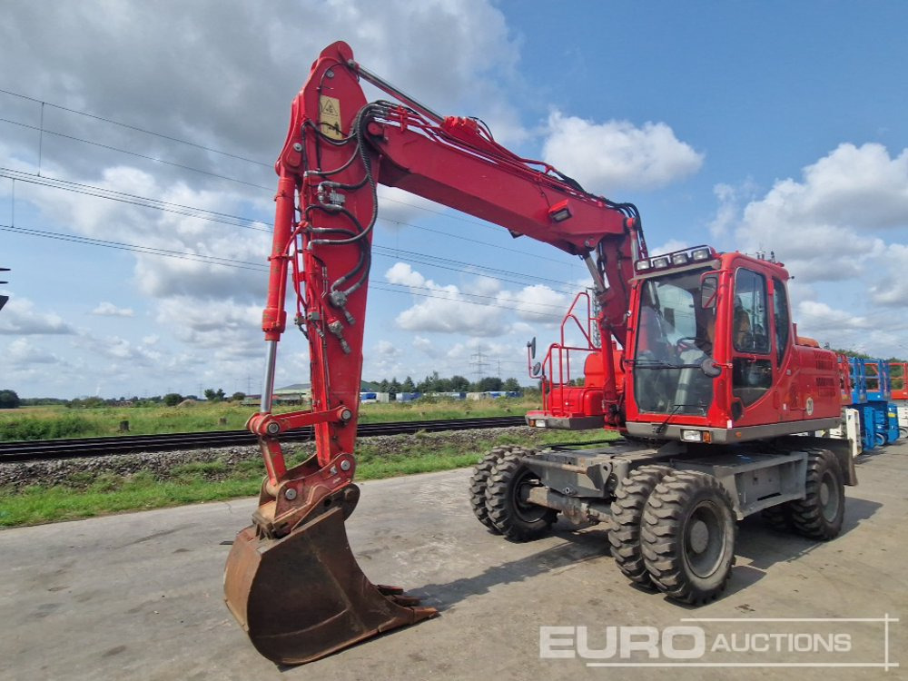 2014 Doosan DX140W-3 - Pelle sur pneus: photos 1 2014 Doosan DX140W-3 - Pelle sur pneus: photos 1