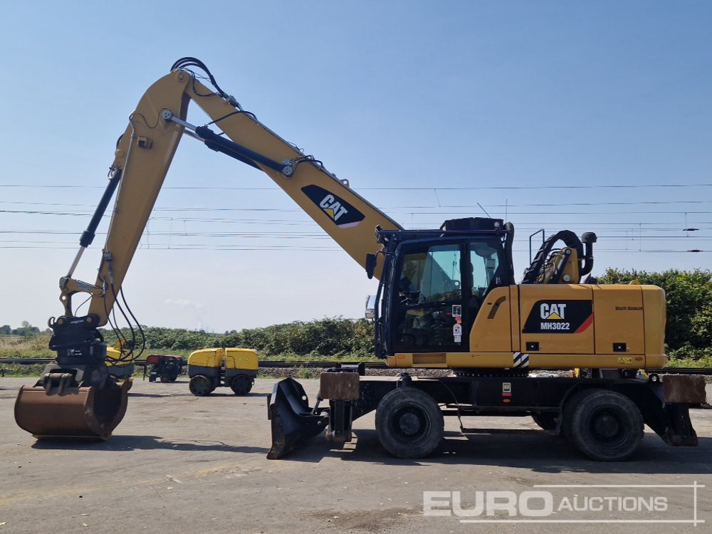 2016 CAT MH3022 - Pelle sur pneus: photos 2 2016 CAT MH3022 - Pelle sur pneus: photos 2