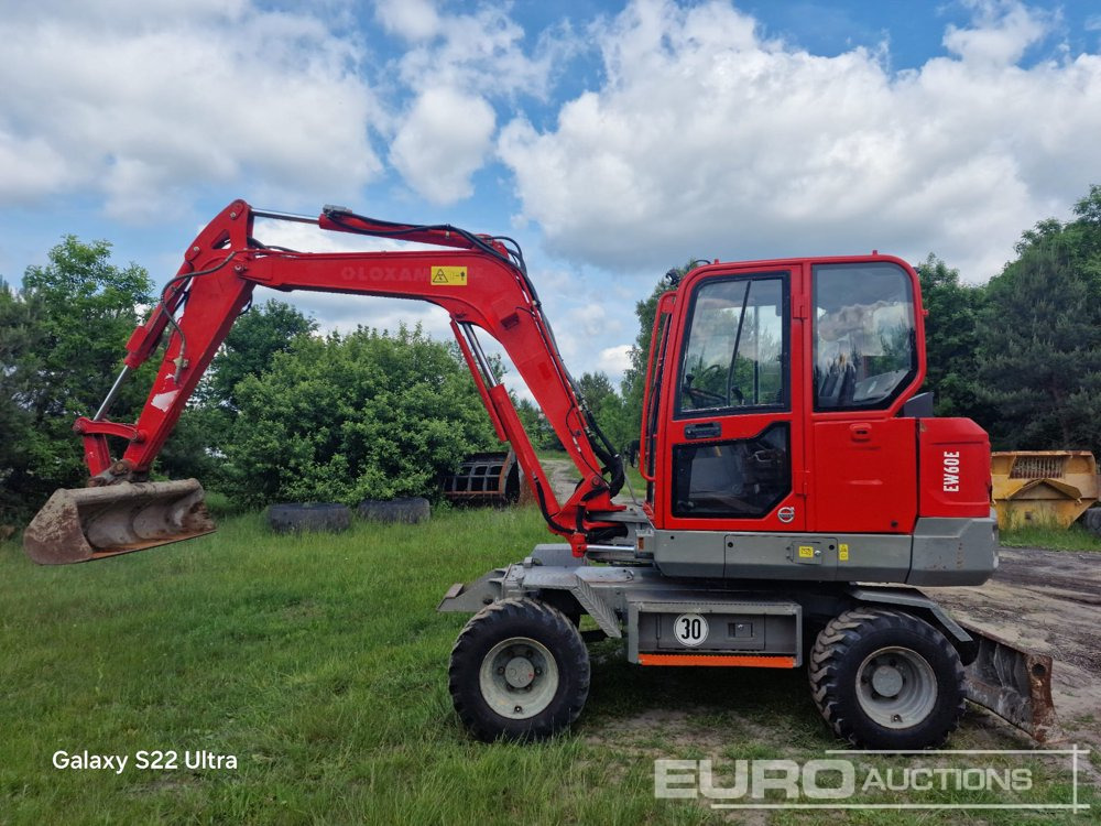 2016 Volvo EW60E - Pelle sur pneus: photos 1 2016 Volvo EW60E - Pelle sur pneus: photos 1