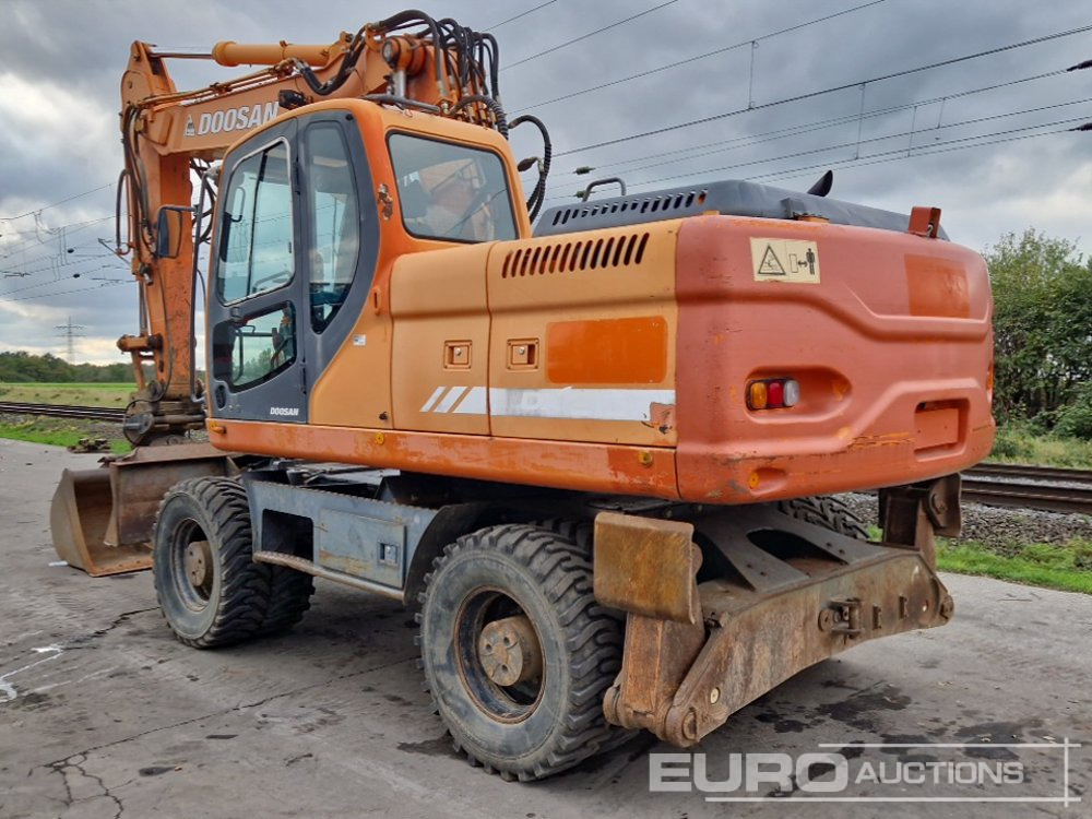 Doosan DX210W - Pelle sur pneus: photos 3 Doosan DX210W - Pelle sur pneus: photos 3