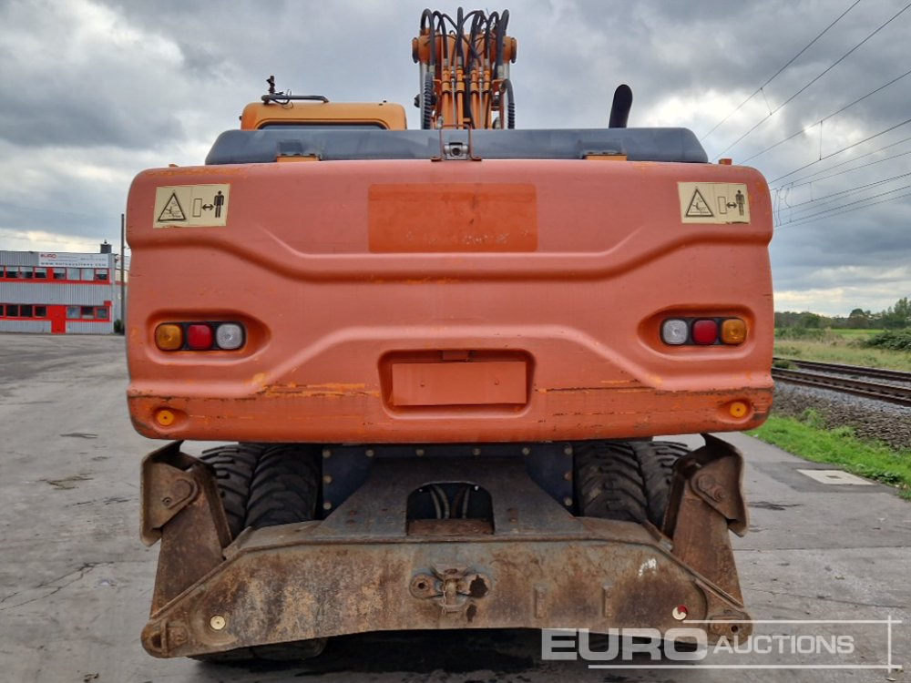 Doosan DX210W - Pelle sur pneus: photos 4 Doosan DX210W - Pelle sur pneus: photos 4