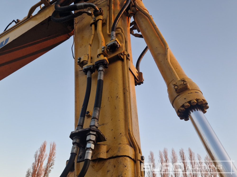 Pelle sur pneus Komatsu PW140-7: photos 22