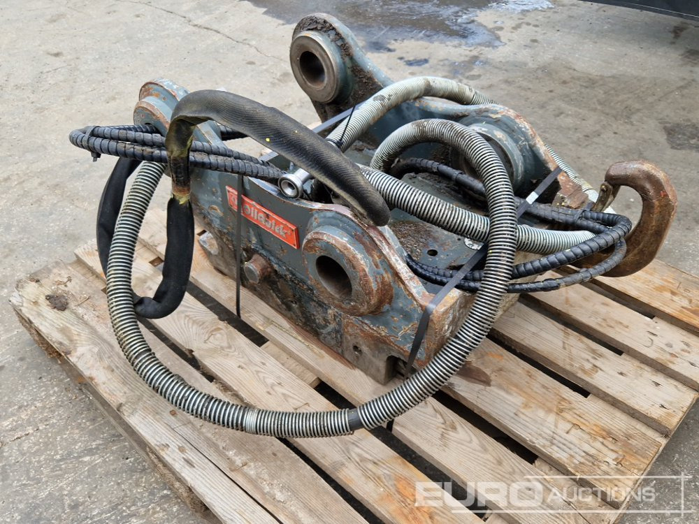 OilQuick OQ65 - Attache rapide: photos 4 OilQuick OQ65 - Attache rapide: photos 4